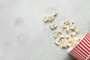 Fototapeta na wymiar Bucket with tasty popcorn on white background
