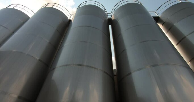 A milk storage tank at a dairy plant. Milk tanks in the unloading area