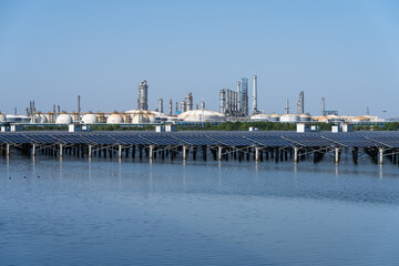 Fototapeta premium solar panels with chemical plant