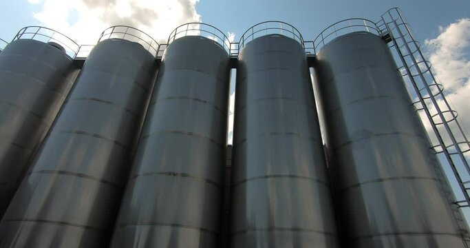 A milk storage tank at a dairy plant. Milk tanks in the unloading area