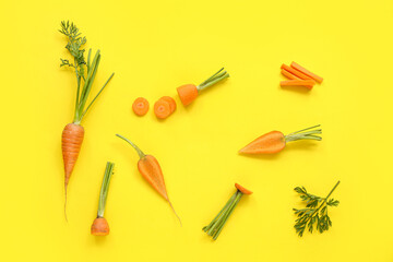 Fototapeta na wymiar Fresh carrot and slices on yellow background