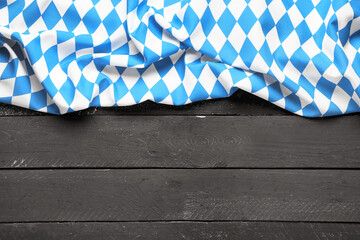 Flag of Bavaria on black wooden background