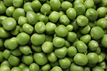 Fototapeta na wymiar Texture of fresh green peas as background