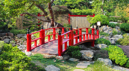Beautiful red bridge in japanese garden