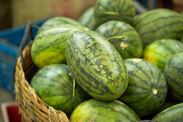 Tropical fruits on display at a Southeast Asian traditional market
