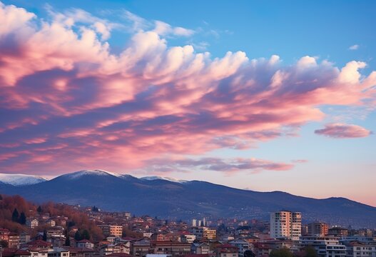 Pink clouds against a blue sky at sunset 