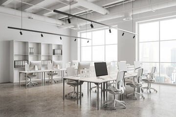 White office room interior with pc computer on table in row, panoramic window