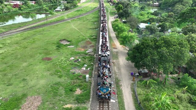 Overcrowded commuter train in Bangladesh during Eid festival