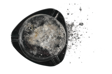 Black glass ashtray with cigarette ash isolated on white, top view