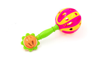 Colourful baby rattle with balls. White isolated background.