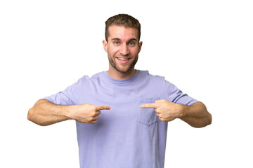 Young handsome caucasian man isolated on green chroma background with surprise facial expression