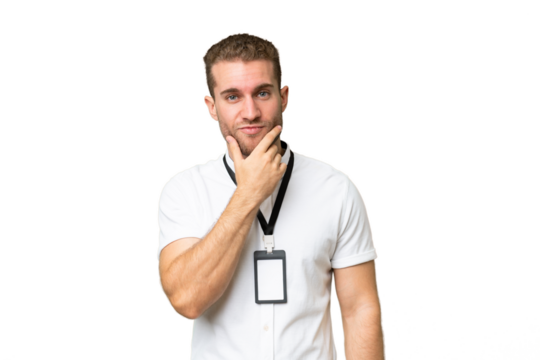 Young caucasian man with ID card isolated on green chroma background thinking