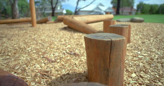 Closeup of a row of stump wood in a playground