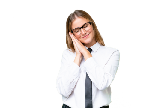 Young business caucasian woman over isolated background making sleep gesture in dorable expression
