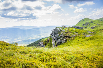 Beautiful view on the Ukrainian Polonynian Beskids to the mountains and valleys. Rocky peaks of the Ukrainian Carpathians in summer. Water-making ridge in the Carpathians, Carpathian mountains
