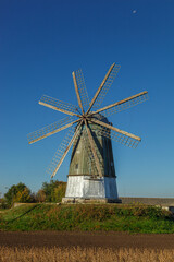 windmill dutch type against blue sky