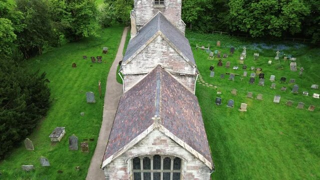 Aerial of the St Michael's Church, Baddesley Clinton in England next to a graveyard