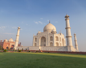 Taj Mahal white marble mausoleum at Agra, India on clear day.  - 618757594