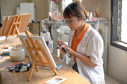 Artist drawing in studio
