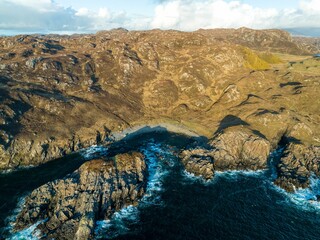 where the rocks meet the waves