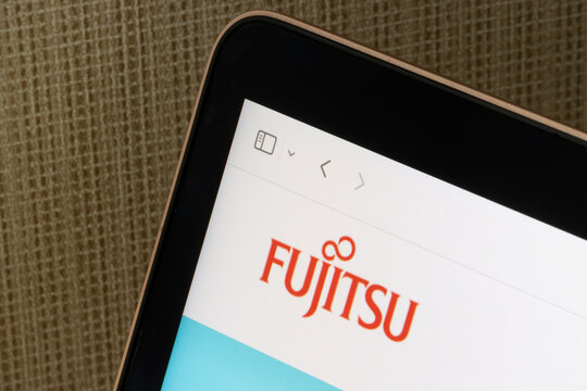 Kyoto, Japan - June 22, 2023: Website homepage of Fujitsu, a Japanese multinational information and communications technology equipment and services corporation, is seen on a laptop computer.
