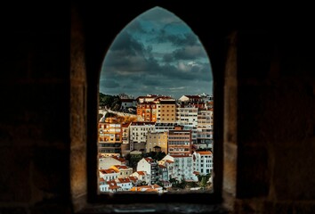 Breathtaking view of a stunning sunset from a window of a castle in Portugal, Lissabon