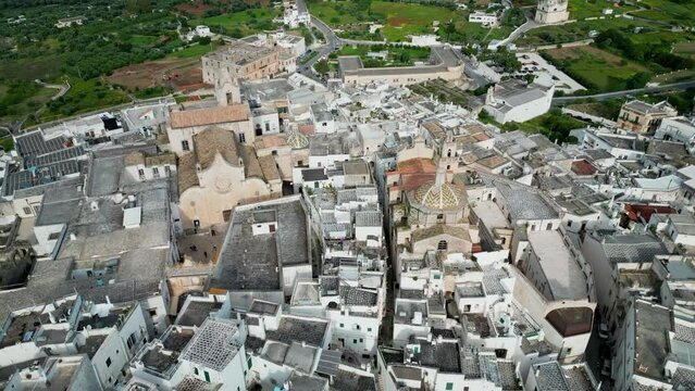 Aerial of the white buildings of Brindisi city in Italy during the daytime