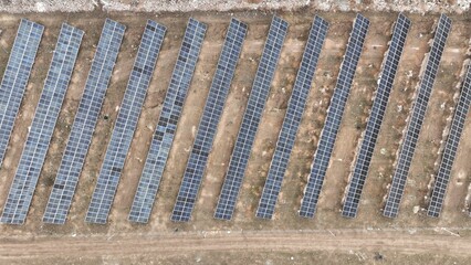 View of a cluster of solar panels on a sunny day