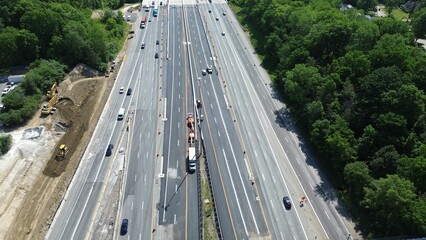 Aerial view of cars traveling along a highway road