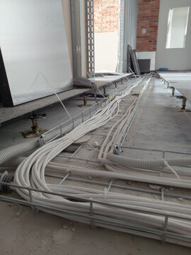 Installation of electrical cables in the tray