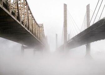 I-65 twin bridges over River Ohio covered in fog in Louisville, Kentucky