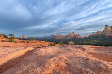 a landscape view from the top of a mountain looking at a beautiful valley