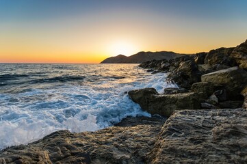Fototapeta na wymiar Mesmerizing view of a beautiful seascape during sunrise in Crete, Greece
