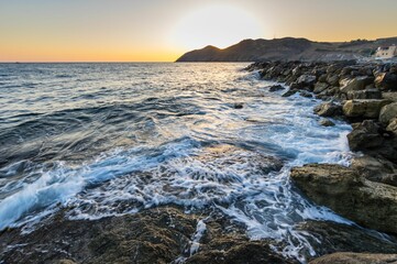 Mesmerizing view of a beautiful seascape during sunrise in Crete, Greece