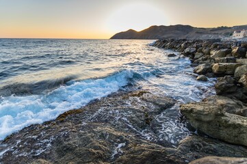 Fototapeta na wymiar Mesmerizing view of a beautiful seascape during sunrise in Crete, Greece