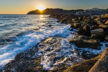 Mesmerizing view of a beautiful seascape during sunrise in Crete, Greece