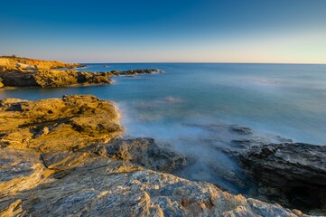 Mesmerizing view of a beautiful seascape during sunrise in Crete, Greece