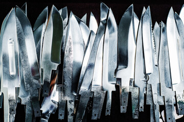 Blanks of steel knives of different shapes and sizes. Production of combat and tactical blades from...