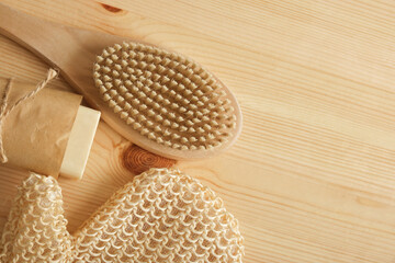Fototapeta na wymiar eco set for self-care, soap, washcloth and massage brush