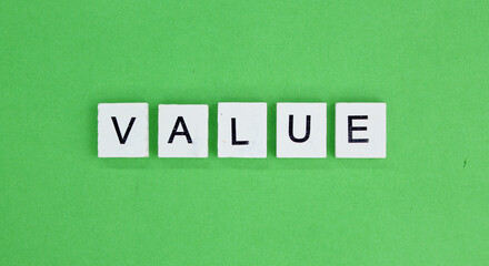 letters of the alphabet with the word value. the concept of value or something of value. financial concept. Values fall and rise