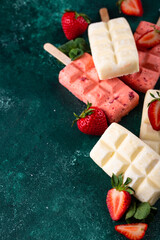 Strawberry ice cream pop sicle with mint