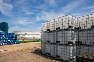The stock of plastic barrels for the chemical industry. white plastic containers. Chemical industry.