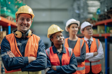 Shot of warehouse members collaborate daily to audit, examine inventory shipments. They organize and monitor storage, update checklists, and communicate effectively to ensure efficient distribution.