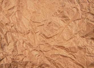 Brown crumpled paper background vignette