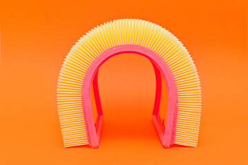 An abstract image of the air new filter. Orange background
