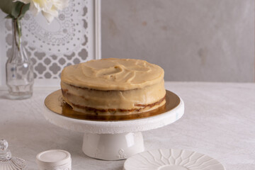 Cake with oranges and caramel cream