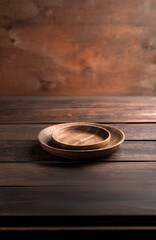 Handmade plate stands on a wooden table