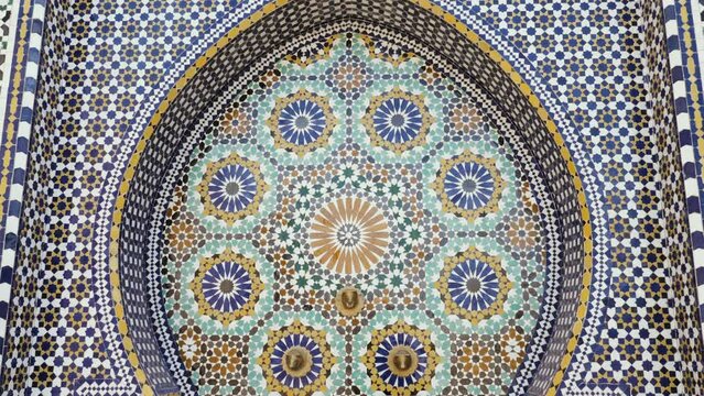 Traditional Moroccan fountain. Typical tile zellige design of Moroccan design. 4k footage.