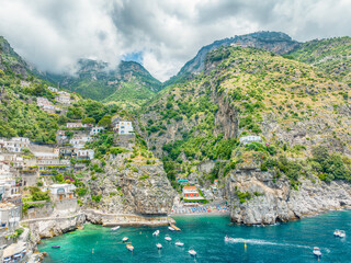 Landscape with amazing Marina di Praia beach near Furore fiord at famous Amalfi coast, Italy