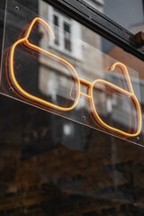 orange sunglasses shape light on showcase